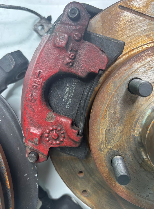 Front Spindles with Brake Rotor & Caliper Set β Drilled & Slotted