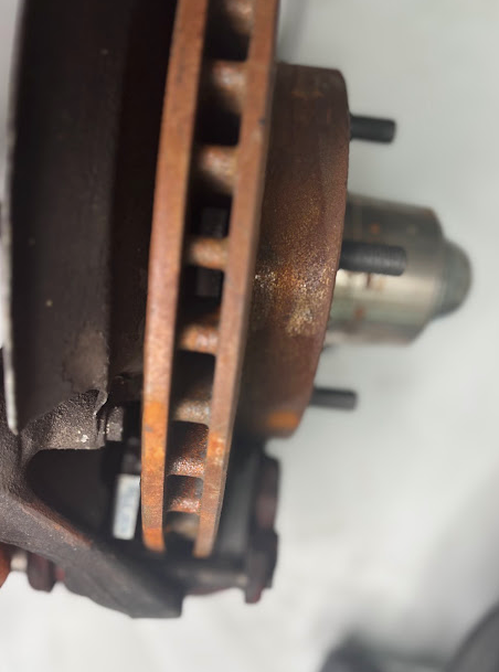 Front Spindles with Brake Rotor & Caliper Set β Drilled & Slotted
