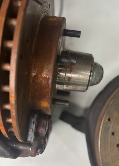Front Spindles with Brake Rotor & Caliper Set β Drilled & Slotted