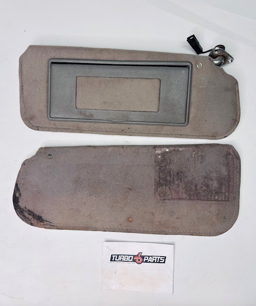 Used 1986–1987 Gbody Sun Visor Set with Mirror and Light – Gray Cloth Pair  (Driver & Passenger)