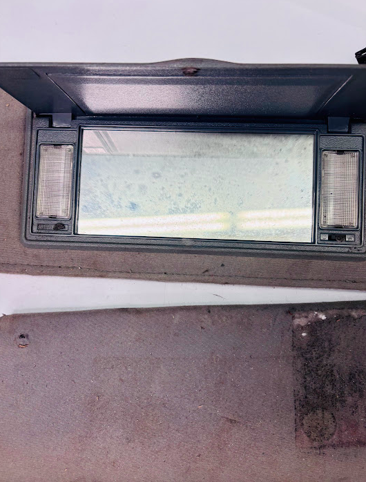 Used 1986–1987 Gbody Sun Visor Set with Mirror and Light – Gray Cloth Pair  (Driver & Passenger)