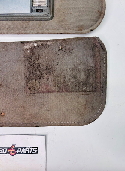 Used 1986–1987 Gbody Sun Visor Set with Mirror and Light – Gray Cloth Pair  (Driver & Passenger)